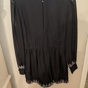Super fun black House of Harlow  romper. L. Long sleeves with keyhole neckline.